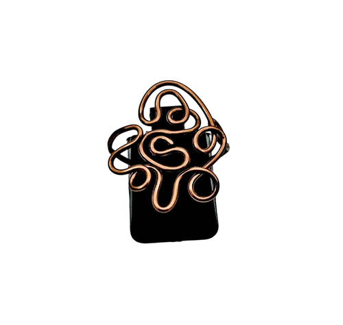 Antiqued copper wire statement ring with intricate free-form design on black base