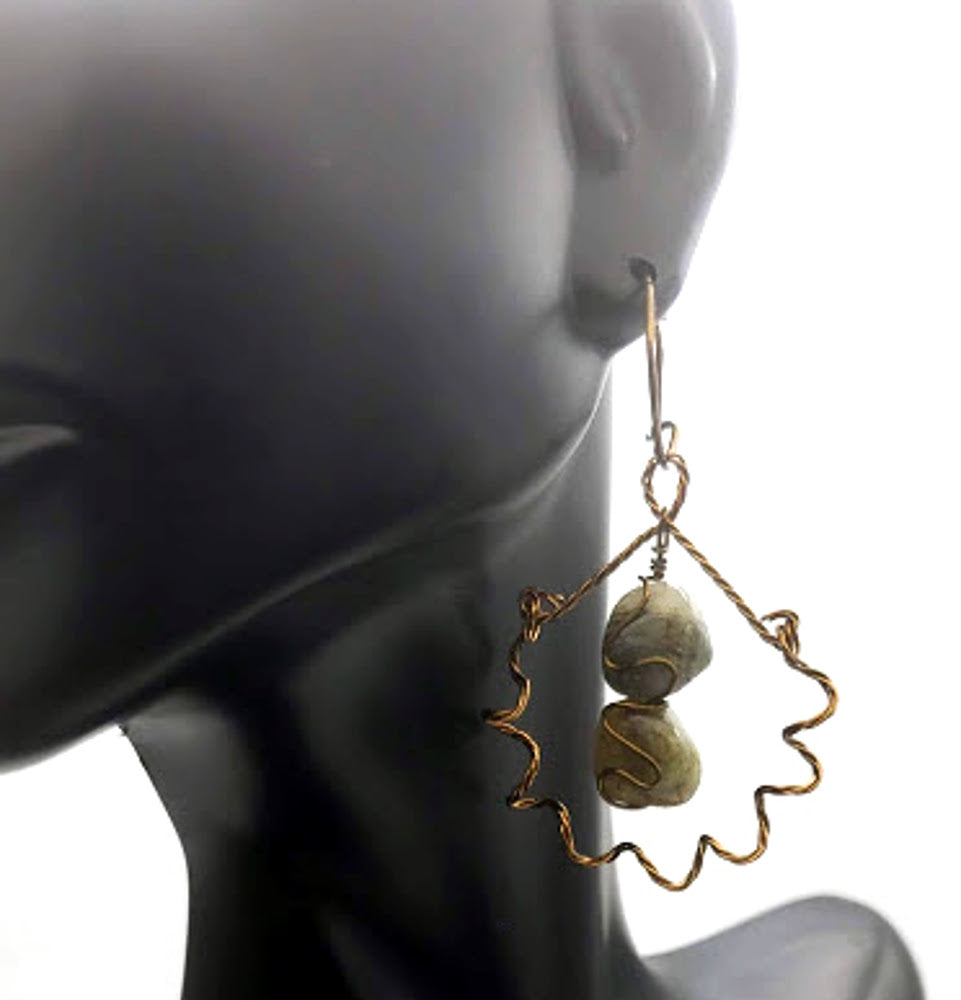 Worn view of Antiqued Green Garnet Earrings handcrafted in twisted antiqued brass, where natural gemstones meet organic, botanical-inspired artistry.