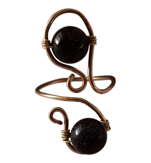 Handcrafted blue Goldstone sculptural ring with sculptural brass wirework