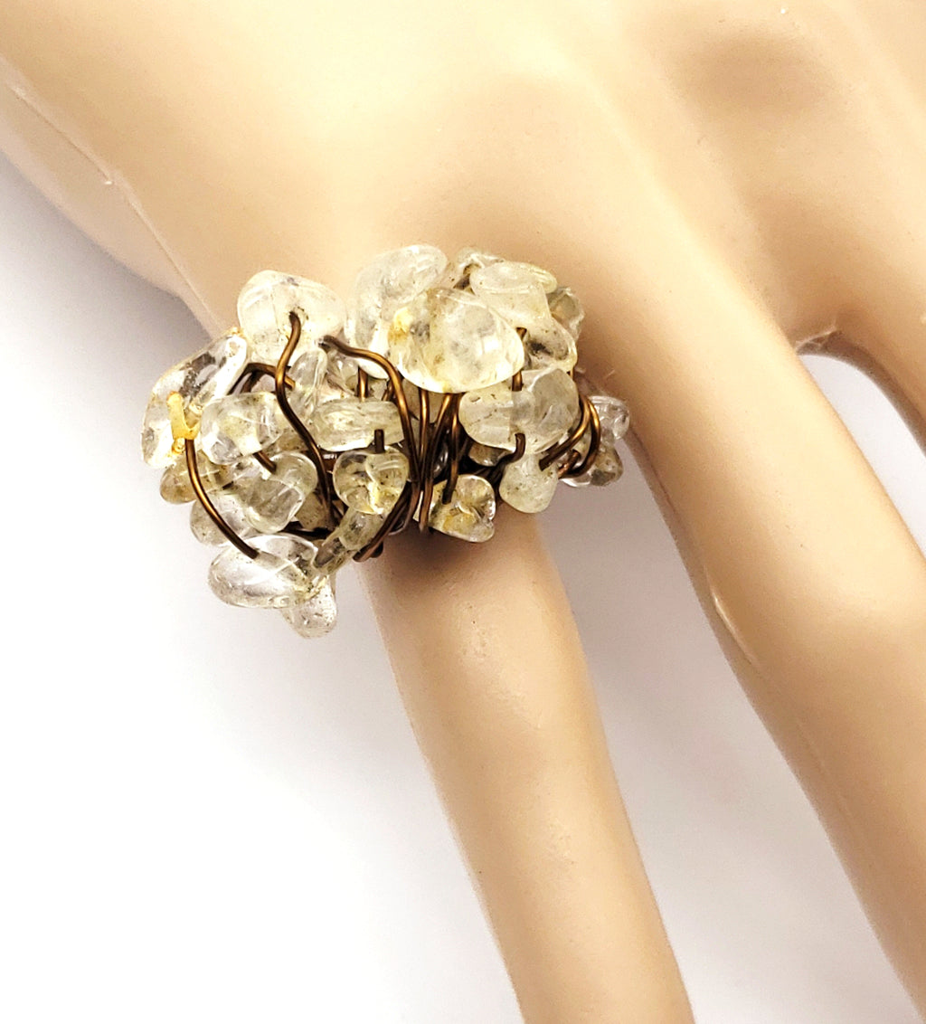 Handcrafted citrine statement ring with natural gemstone chips worn on the hand