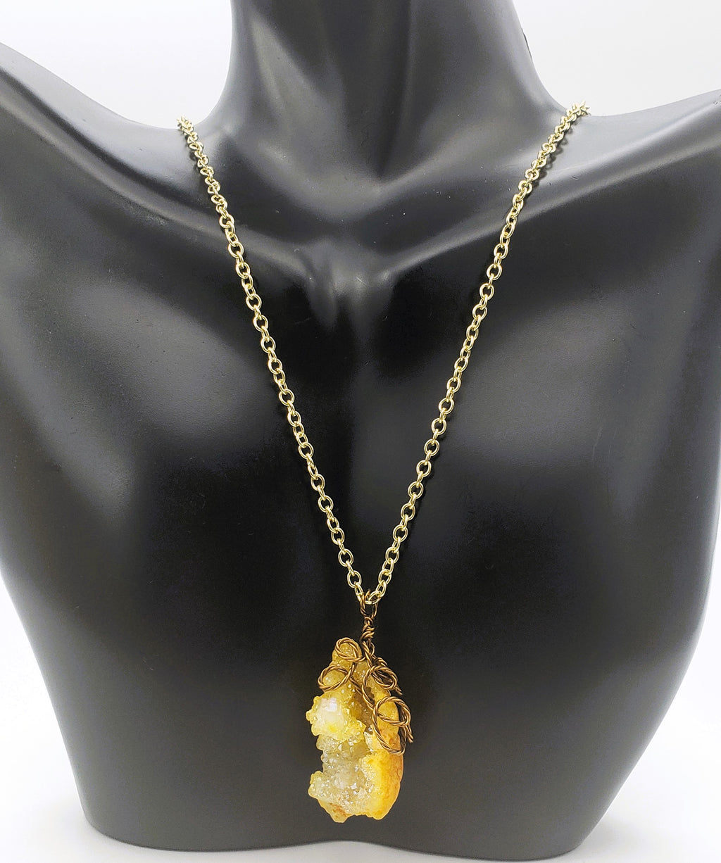 Worn view of Druzy Quartz Necklace handcrafted with antiqued brass.