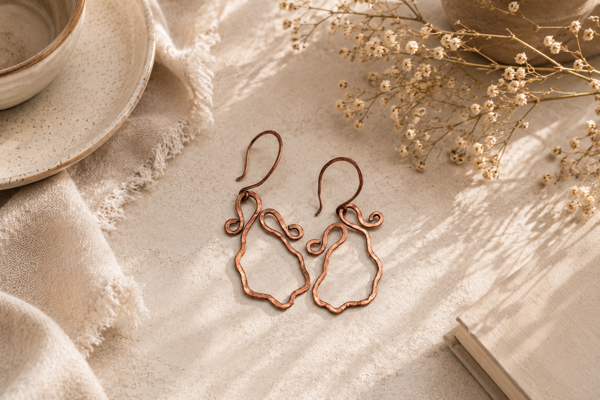 Handcrafted copper wire earrings styled in a warm relaxed setting for the Everyday Artistry Collection